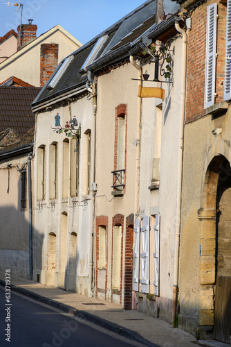 Walking in touristic old village with abbey Hautvillers, cradle of sparkling wine champagne, France photo