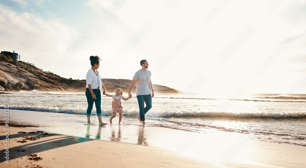 Walking, holding hands and family on the beach at sunset on vacation, adventure or holiday together. Travel, bonding and girl child with her mother and father on the sand by the ocean on weekend trip