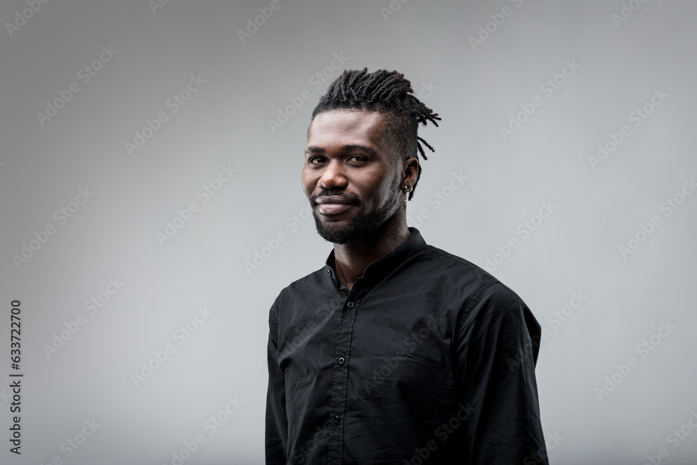 Three-quarter view, black man, smile, attentive Three-quarter view, black man, smile, attentive