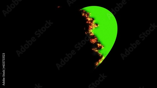 visual effect burning in a flame loving heart broken from love on a green chrome key background. Video 4k, motion design