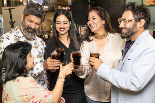 Indian people enjoying party at restaurant