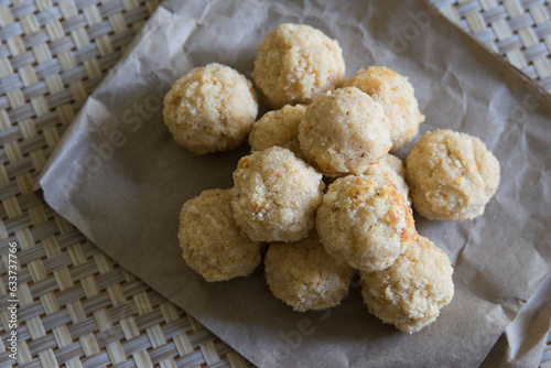 Traditional indian dessert rava laddu sweet coconut semolina balls, selective focus