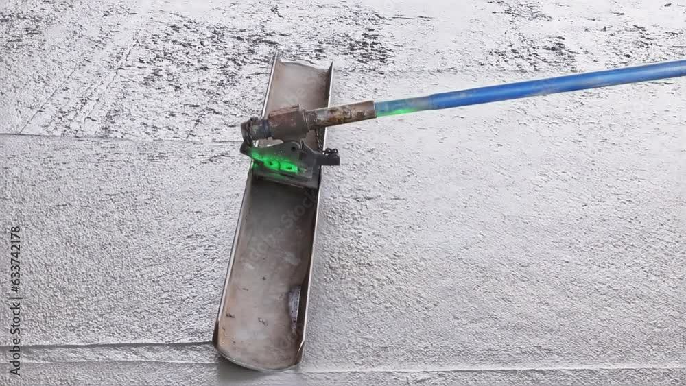 In addition to leveling concrete for driveways, workers use trowel level
