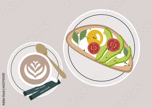 A top view perspective of a cappuccino cup on a saucer, accompanied by packets of natural cane sugar and a plate with avocado toast, the arrangement embodies a trendy approach to to food and lifestyle