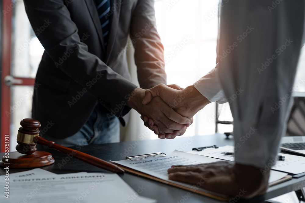The handshake after a good cooperation, consulting between attorney and