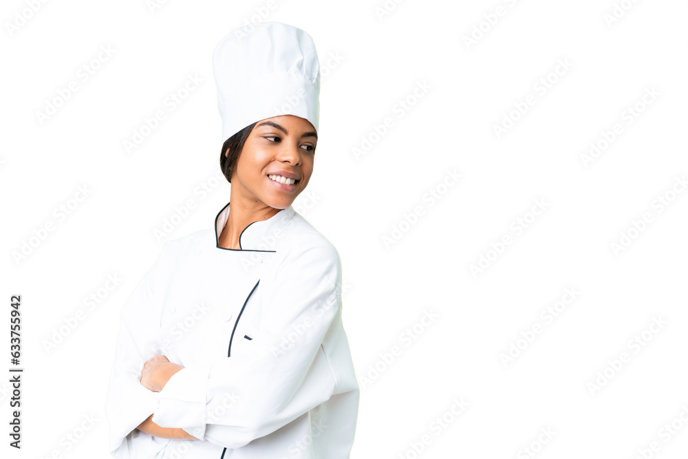 Young African American chef over isolated chroma key background with arms crossed and happy Young African American chef over isolated chroma key background with arms crossed and happy