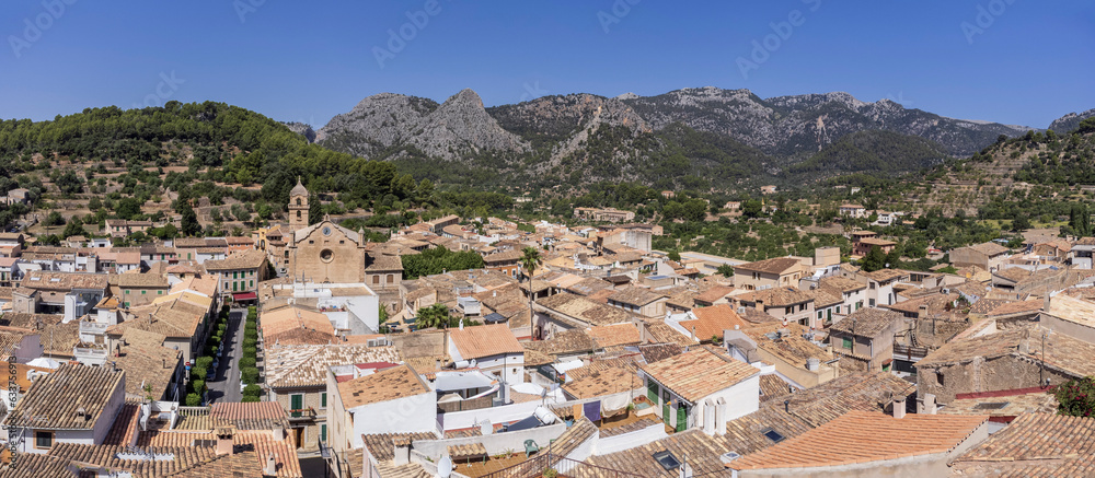 Bunyola,view of the town with the Sierra de Tramuntana in the background and the mountain Teix. Majorca, Balearic Islands, Spain