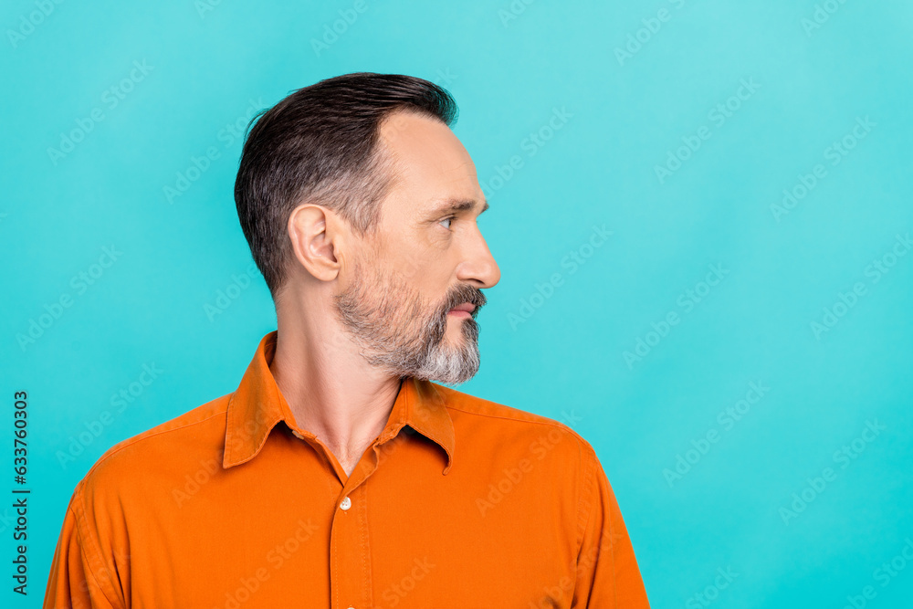 Side profile photo of middle age business man after barbershop looking empty space proposition isolated on aquamarine color background