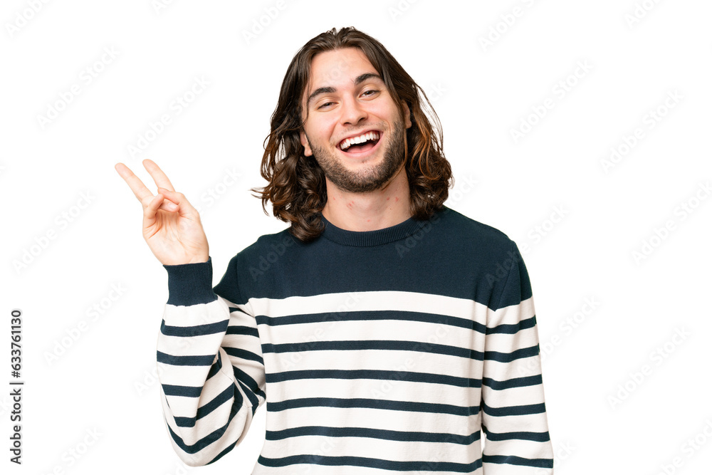 Young handsome man over isolated background smiling and showing victory sign Young handsome man over isolated background smiling and showing victory sign