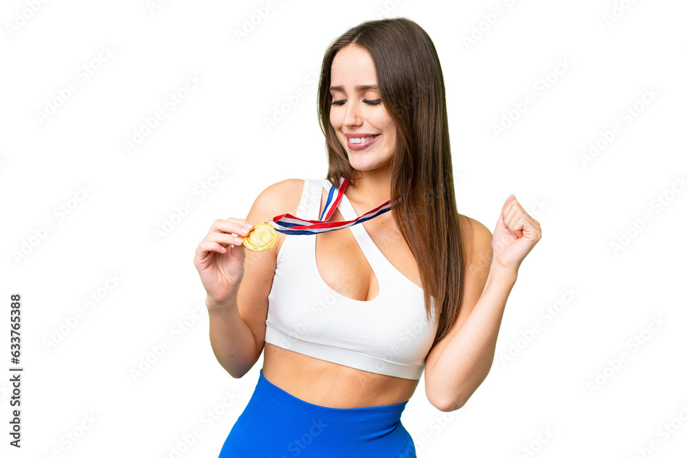 Young beautiful woman with medals over isolated chroma key background celebrating a victory