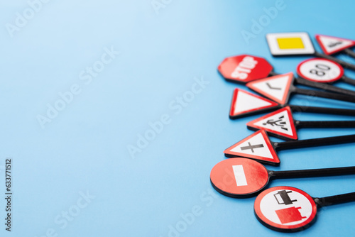 driver education, road signs road signs on a blue background, copy space