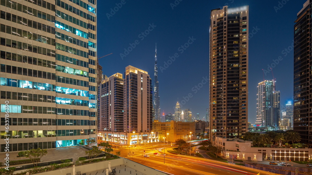Aerial panoramic view to Dubai downtown and difc skyscrapers day to night timelapse. Aerial panoramic view to Dubai downtown and difc skyscrapers day to night timelapse.