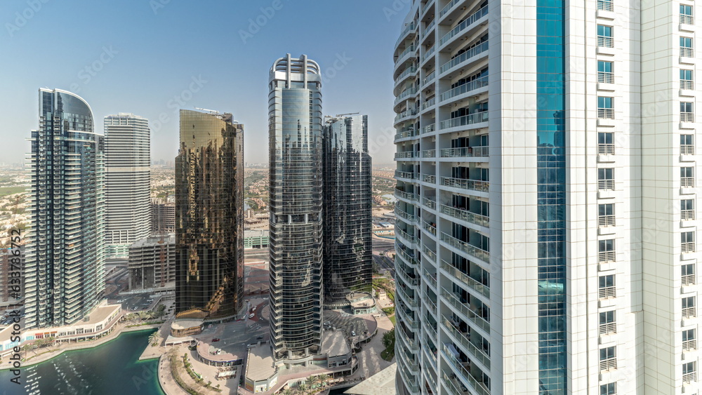 custom made wallpaper toronto digitalPanorama showing tall residential buildings at JLT aerial timelapse, part of the Dubai multi commodities centre mixed-use district.