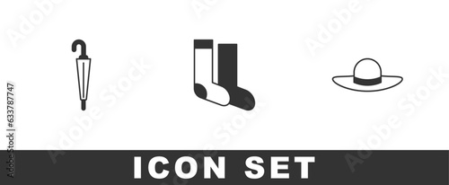 Set Umbrella, Socks and Elegant women hat icon. Vector