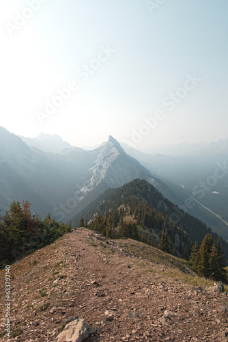 Views of mountains and forests on a summers day in Kananaskis Country, Alberta, Canada from on top of King Creek Ridge