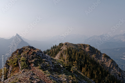 Views of mountains and forests on a summers day in Kananaskis Country, Alberta, Canada from on top of King Creek Ridge