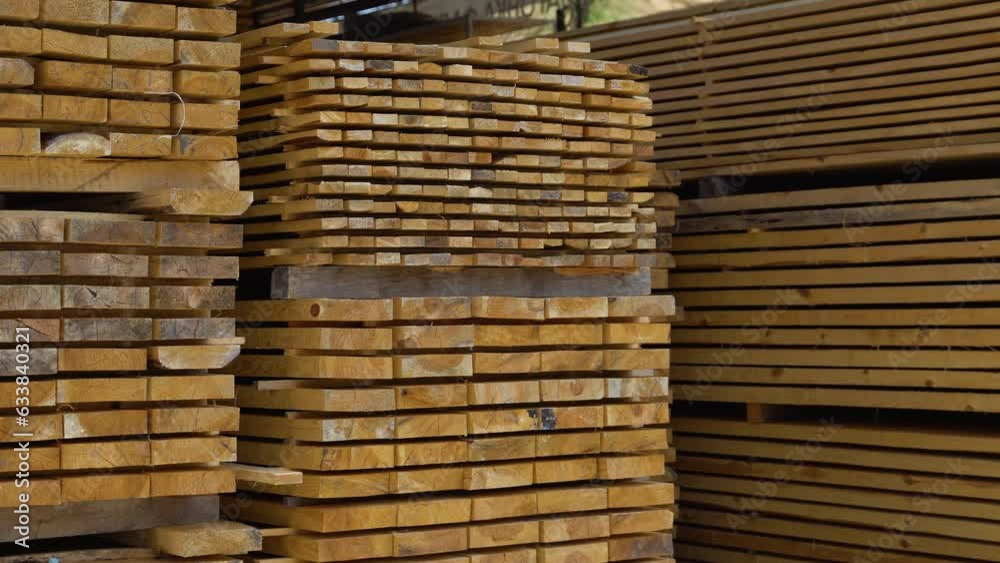 Wooden boards in a warehouse of building materials Wooden boards in a warehouse of building materials