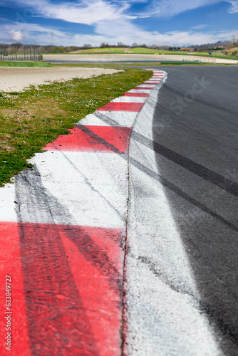 Motor sport curbs and skid marks close up on motor sport racetrack