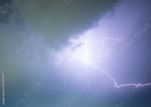 beautiful lightning in the night sky among the clouds during a thunderstorm