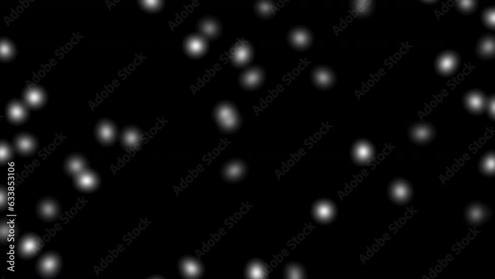 Large dust particles flowing in the air on a black background. Seamless loop 4K animation Large dust particles flowing in the air on a black background. Seamless loop 4K animation