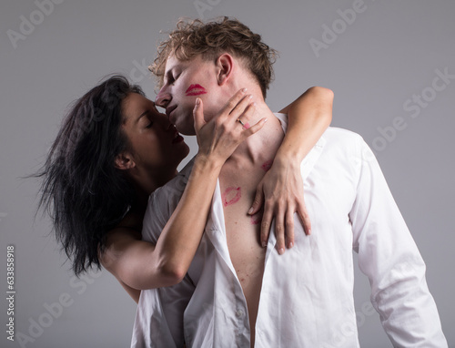 Close-up of young romantic couple is kissing