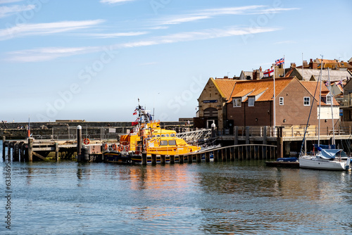 Whitby lifeboat moored outside the RNLI lifeboat shed in Whitby marina on the North Yorkshire coast © yackers1