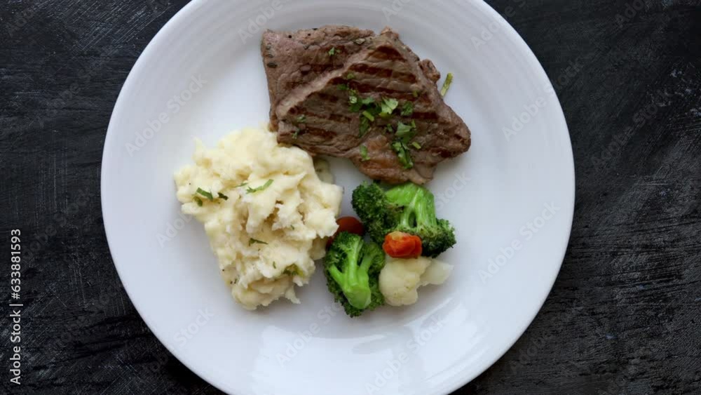 Eating Mashed Potatoes with Steak and Vegetables Eating Mashed Potatoes with Steak and Vegetables