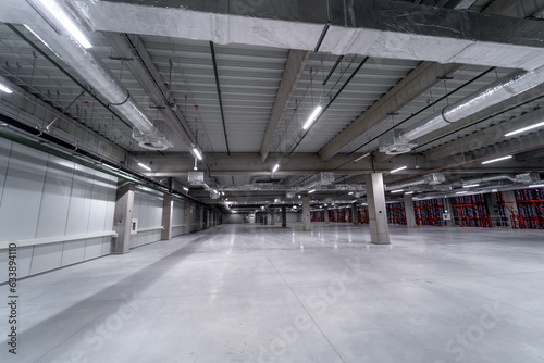 Empty industrial hall with ceiling ventilation system