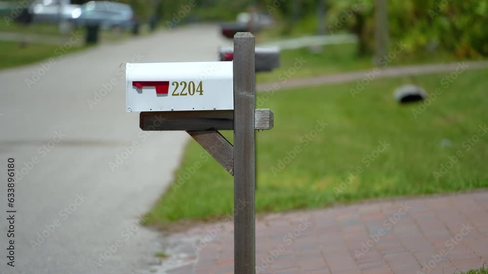 American mailbox at Florida home front yard on suburban street side American mailbox at Florida home front yard on suburban street side