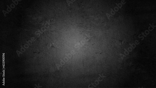 Concrete wall black color for background. Old grunge textures with scratches and light shadow. Black painted cement wall texture.