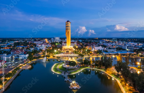 Aerial View  Roi et tower or Vote Tower 101 and  Bung Plan Chai  This park in the middle of Roi Et's lake in the city center in sunset time,Province Roi Et Thailand. photo