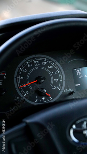 car dashboard with speedometer, slow speed 20 km/hour