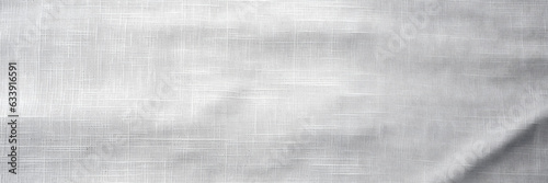 Textured White Fabric Background, Soft light casting shadows over the subtle textures of a white fabric surface