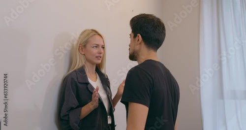 angry blonde woman is arguing with her man and slaps him: jealousy, Slow motion. physical and psychological violence, abuse. Husband shocked after woman slap, family quarrel, uncontrolled aggression