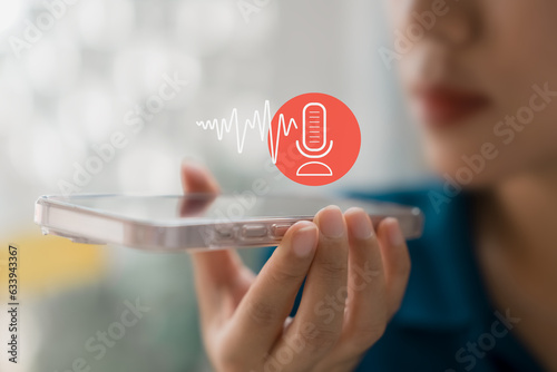 Modern Voice Recording, Hand Holding Microphone Icon on Smartphone Capture Sound Music and Voice Messages with this Voice Recording App. Use AI Enabled Internet Search for Easy Access to Information.