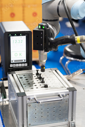 electric wrench with torque control working with robot arm in automation industrial