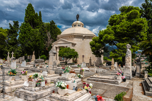 Cavtat, Croatia 07-26-2023 The historical cementary of the fishing village of Cavtat near Dubrovnik with the Family Racic's mausoleum on top of the hill