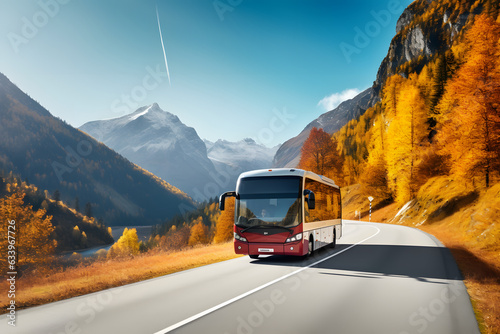 Exterior shot of a travel bus driving along a mountain road in autumn.