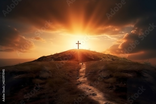 The cross of God in the rays of the sun. Cross on the hill. Religious concept.  photo
