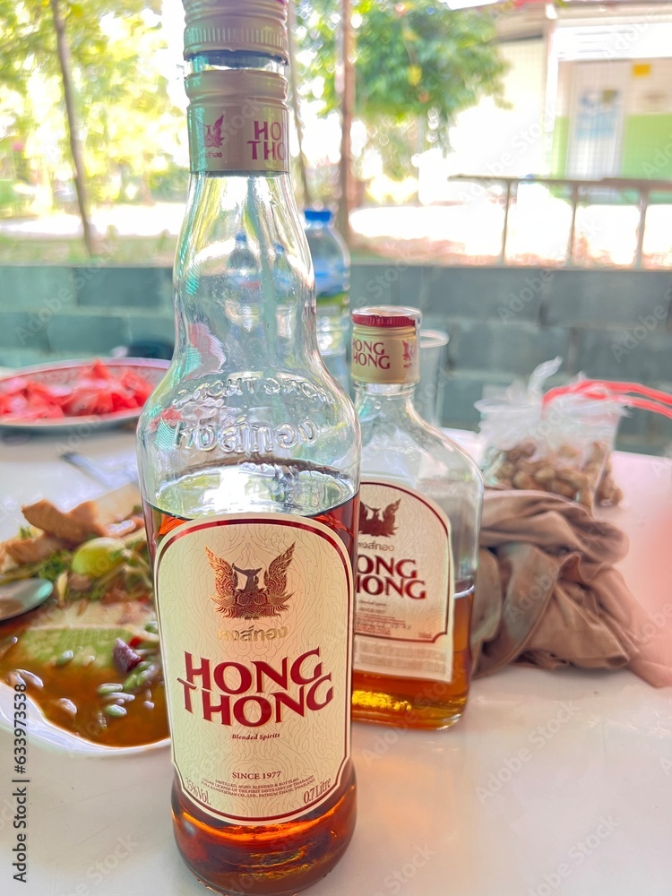 View of Bottle of Hong Thong Thai whiskey Spirit Table papaya salad, 12