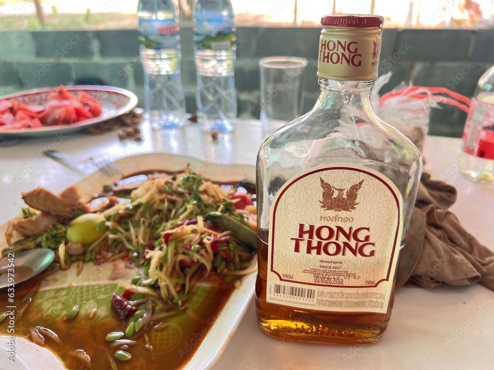 View of Bottle of Hong Thong Thai whiskey Spirit Table papaya salad, 12