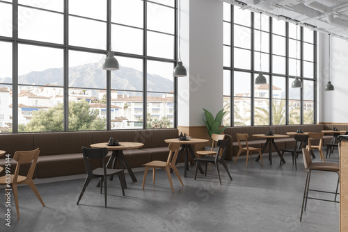 Modern cafe interior with chairs and table  eating corner with panoramic window