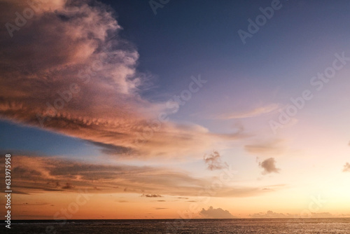  Cotton stratocumulus clouds with the glare of sunset background. Beautiful landscape, it is suitable for background and wallpapper.  photo