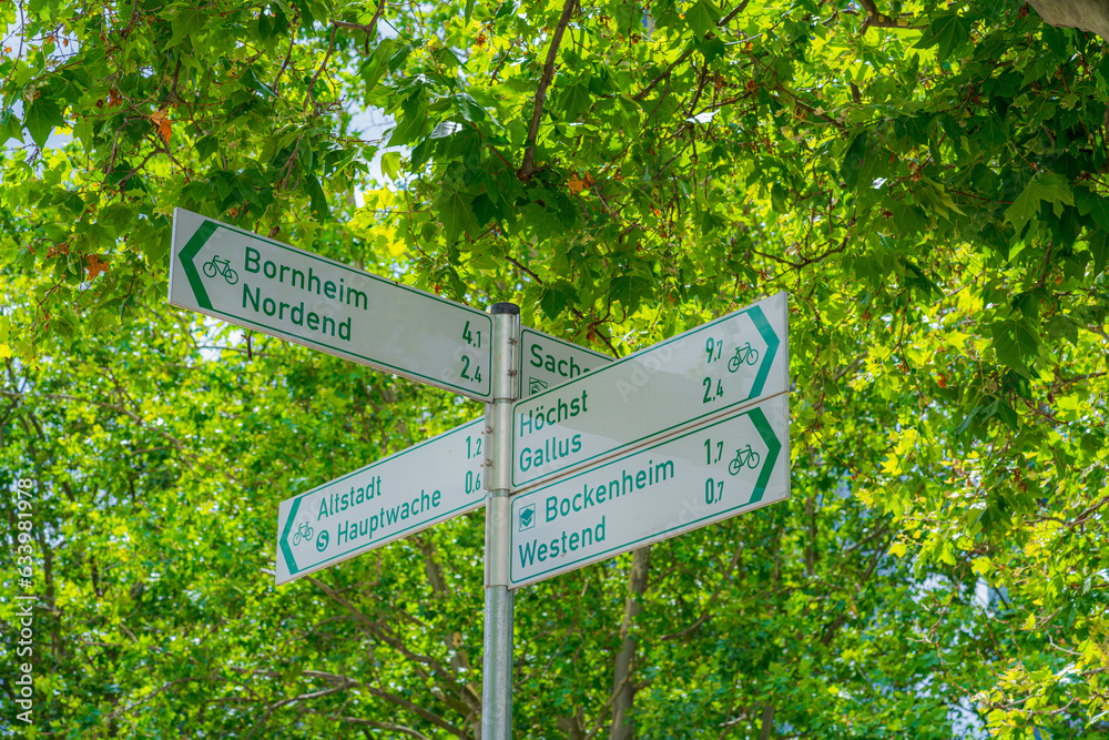 Frankfurt am Main, Germany. July 5, 2023. Signpost showing directions and distances for cyclists
