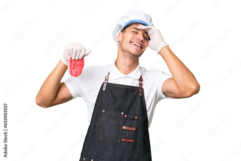 Butcher caucasian man wearing an apron and serving fresh cut meat over isolated background smiling a lot