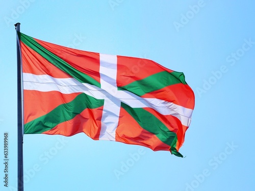Basque Country flag or ikurriña waving sky, The symbol of the Basque Country Autonomous Community photo