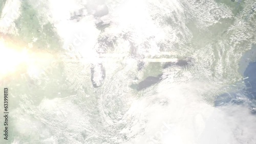 Zoom in from space and focus on Burton, Michigan, USA. 3D Animation. Background for travel intro. Elements of this image furnished by NASA