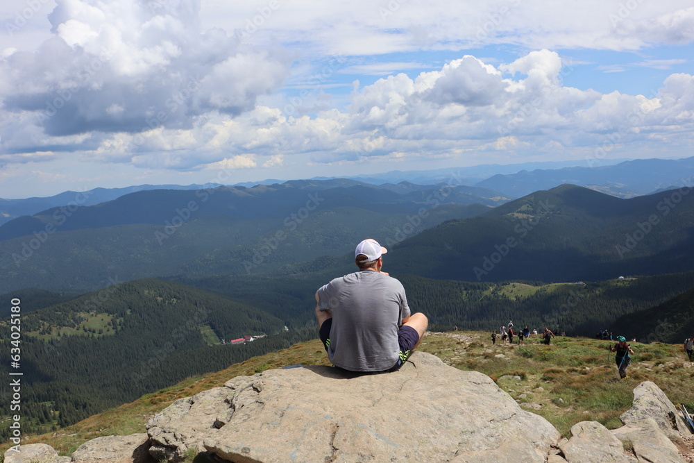 Fototapeta premium hiker on the top of mountain