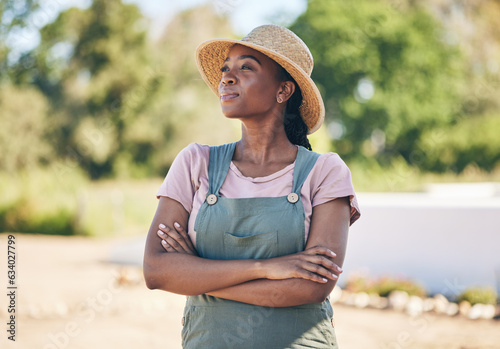 Black woman, thinking and farmer with arms crossed in nature for sustainability outdoor. Idea, agriculture and confident person on land for agro, eco friendly vision and summer garden countryside