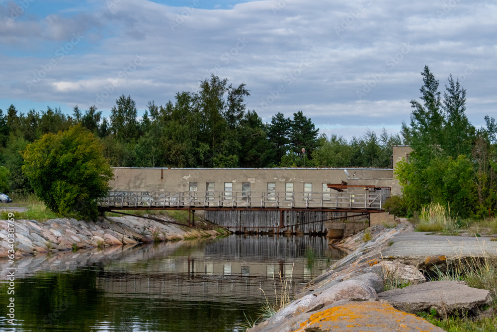 Abandoned soviet facility, originally a fisherman' s collective farm with the job of farming rainbow trout sits abandoned today in Parispea, Lahemaa national park, Estonia. August 2023